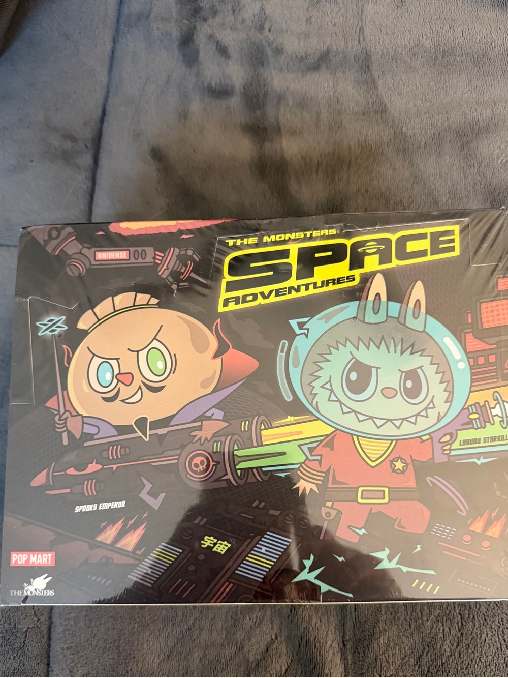 Entire case of 12- Pop Mart The Monsters Space Adventures. Sm dent on box.